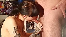 tattooed teen gets multiple titty cumshots in bukkake gangbang