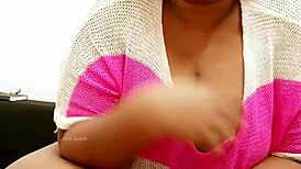 this sexy girl with big tits is just hanging out, showing off her curves in a casual way