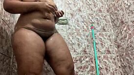 Ebony Woman Twerks To Funk Music On Red Platform