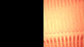 Public Outdoor Encounter with Husband on Grass, Guard Witnesses Intimate Moment.