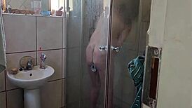 Caught Stepmom Using Glass Dildo In Shower