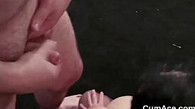 horny beauty gets cum load on face, eating all the jizz in blowbang bukkake! 😍