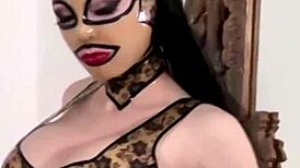 masked babe in stockings teases with solo leg-spreading play