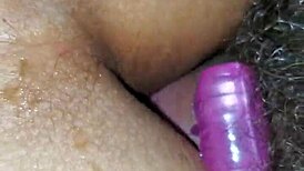 Homemade video of toothless person in intimate moment.