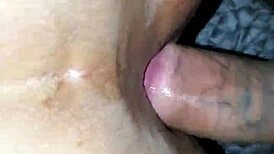 Homemade video of toothless person in intimate moment.