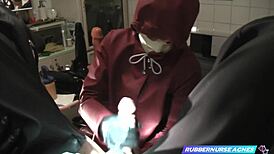 Agnes, which is a latex clad nurse, performs a prostate massage handjob on her patient