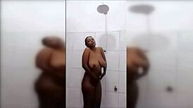 Huge Titted Black Cutie Has a Shower