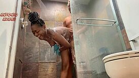 Morning shower sex with a tattooed ebony beauty on Red.