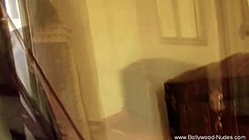 Brunette asian strips seduces while dancing nude