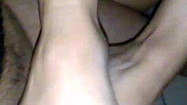 She says, 'Give me a footjob and cum on my sexy feet.'