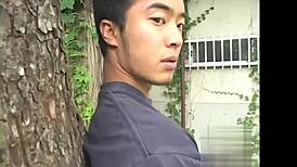 Japanese gay twink jerks off in outdoor shower bathing!