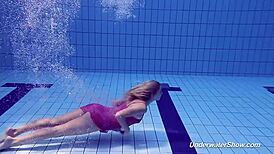 proklova strips bikini for underwater swim