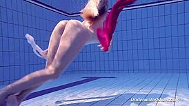 proklova strips bikini for underwater swim