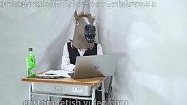 A Female Office Worker Wears a Mask at Work