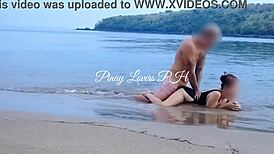 amateur couple gets naughty with public sex on sunny beach