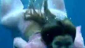 Are These Hot Teens In Bikinis Bathing Underwater In Tenerife Sea?
