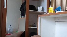 Sexy gay in red cd and mask plays with toys