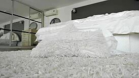 Amateur casually plays with her pussy on webcam at home.