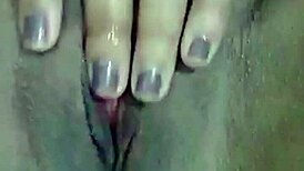 Solo ebony girl enjoys softcore masturbation session