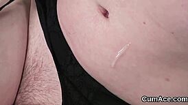 The horny hottie receives a jizz load on her face, eating all the ejaculate.
