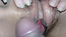 My young girlfriend lets me play with her wet pussy while watching tv