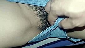 My young girlfriend lets me play with her wet pussy while watching tv