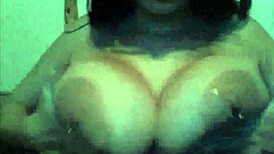 She's playing with her big boobs on webcam!