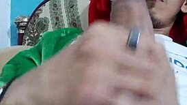 Young tattooed twink slaps his good cock while masturbating in dirty solo scene