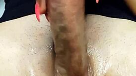 Oiled handjob leads to massive cum bust 😏