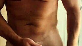 Got horny while pissing in the bathroom with my big cock.