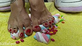 Goddess kiffa crushes candies and marshmallows!