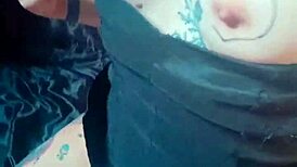 Woman with huge pussy lips shows off hairy goth tits and masturbates