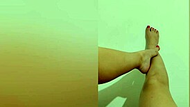 Shy hottie with red pedicure shows off her sexy legs on camera