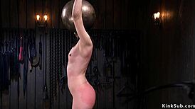 Small Tits Slave Endures Butt Whipping in Bizarre Bondage Fetish