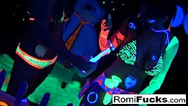 romi rain and dani daniels get into some lesbian black-light fun with big tits and ass
