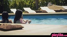 Two brunette pornstar hotties have an outdoor threesome by the pool, performing blowjobs.