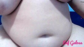 BBW talks to boyfriend while masturbating deliciously on phone