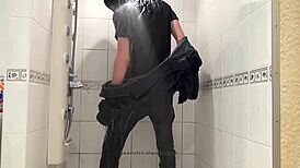 Master In Blue Jeans Washes Feet In Bathroom