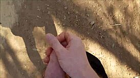 guy jerks off in the bush outdoors