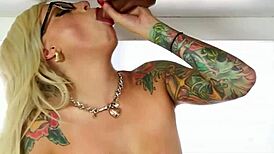 Blonde Tattooed Masseur Sucks Under Table