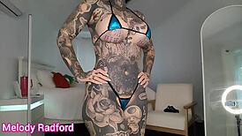 petite woman with blue eyes tries on micro bikinis in haul