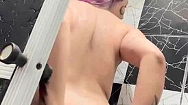 Tattooed Woman Showers And Displays Her Tits And Pussy