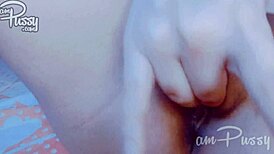 Amateur Asian babe fingers her tight pussy in close-up view