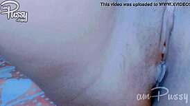 Amateur Asian babe fingers her tight pussy in close-up view