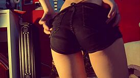 I watch the petite teen ride a dildo with a butt plug.