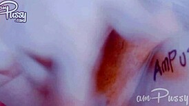 Amateur Asian babe fingers her tight pussy in close-up view