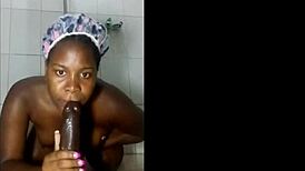 i'm sucking and riding my huge black dildo