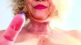 Mature lady enjoys playful moments during her work break