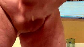 A 65-year-old man passionately masturbates his average cock in a homemade close-up