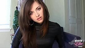 brunette femdom dominates with gloves, forcing anal on small cock in humiliation.